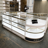 Comptoir de présentation autoportant haut de gamme avec éclairage LED et plateau en verre, base de rangement pour centres commerciaux et salles d'exposition professionnelles