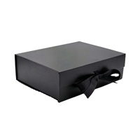 Boîte cadeau magnétique pliable haut de gamme avec doublure en éponge, emballage en carton en forme de livre, ruban, impression UV, gaufrage, dossiers