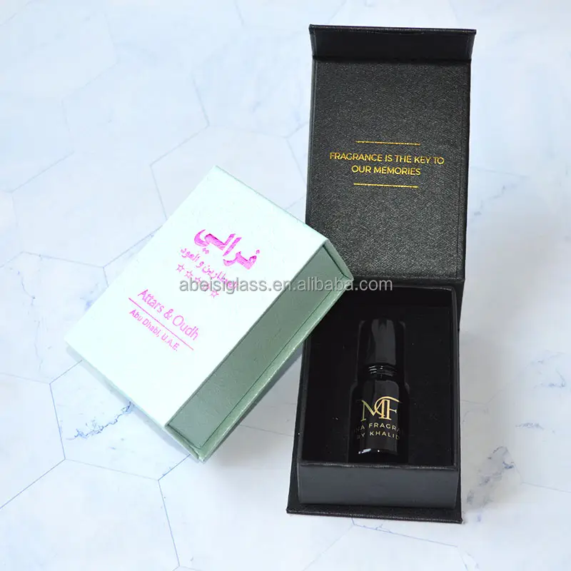 Fabrika doğrudan özel Logo 3 Ml 6 M 10 Ml 12m fantezi sekizgen rulo Oud yağı Attar şişesi kutusu