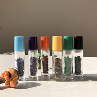 <strong>Amazons</strong> <strong>Top</strong> <strong>Seller</strong> Crystal Glass Bottle Roller Quartz Stone Chips Massage Bottle for Eyes Lip