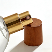 Flacon de parfum cylindrique en cristal de luxe unique en gros, flacon de parfum en verre vaporisateur adapté à diverses occasions