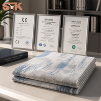 Tapis moderne en polypropylène ultra doux de 12 mm d'épaisseur, motif bleu glacé, effet aquarelle dégradé, brillance soyeuse Liuli
