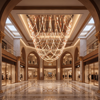 Lustre suspendu LED en verre tressé personnalisé pour hall d'hôtel de prestige et projets d'ingénierie