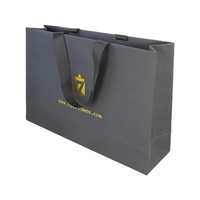 Sac cadeau en papier kraft de luxe avec logo personnalisé Emballage de luxe pour vêtements vêtements parfum poignée en coton pour le shopping