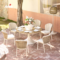 Artie'nin alüminyum veranda mobilya takımı Modern stil veranda yemek seti yuvarlak dış mekan mobilyası yemek sandalyeleri Set 6