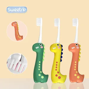 Factory premium dinosaur kids toothbrush 0.12mm soft filament children toothbrush cartoon toothbrush wholesale for child