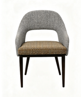 Fauteuil contemporain rembourré à accoudoirs courbes avec dossier ajouré en tissu, idéal pour hôtels, espaces extérieurs et hôpitaux, résistant à l'eau