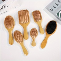 Brosse à cheveux démêlante en bois de bambou avec logo personnalisé, fabricant de brosses à coussin d'air en bambou pour femmes