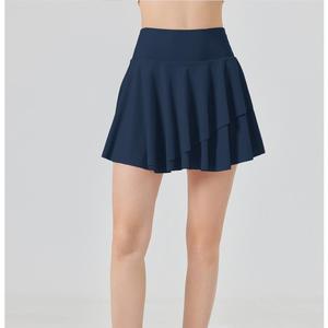 Falda mini acampanada con volantes superpuestos para mujer, de secado rápido y transpirable, con pantalones cortos incorporados y bolsillos laterales, ideal para golf y tenis. - Product Image 1