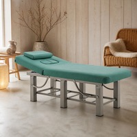 Table de massage robuste avec cadre en tube carré courbé, six pieds et sommier à lattes pour salons de beauté