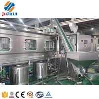 Machine de remplissage d'eau en fût de 5 gallons (19 litres) à petite échelle 100 BPH, équipement de remplissage de seaux d'eau minérale pour l'industrie et les entreprises