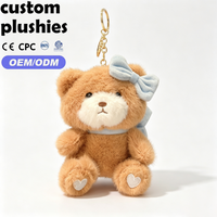 Llavero de peluche de oso de peluche personalizado a precio de fábrica, colgante de oso esponjoso con lazo de doble cara para decoración de mochilas y regalo