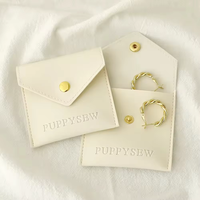 Sac à bijoux Portable en cuir PU avec bouton pression Logo personnalisé pour boucles d'oreilles bague Bracelet stockage cadeaux emballage pochette à bijoux