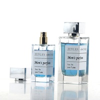 Flacon de parfum noir OEM personnalisé de 30ml 50 ml 100ml rectangulaire vintage portable vide en verre de pulvérisation carré de 50 ml avec couvercle en plastique