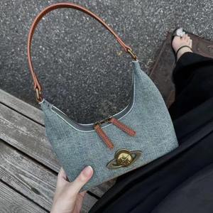 Sac à bandoulière en jean à poignée unique pour femme, élégant et portable, avec fermeture éclair, design Wandering Planet Niche Cowboy, toutes saisons - Product Image 1