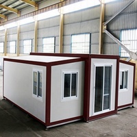 Maison conteneur préfabriquée extensible de luxe avec 2 chambres aux normes australiennes avec panneau sandwich pliable en acier pour cuisine