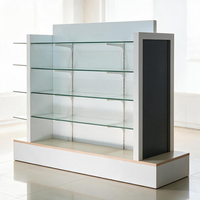 Vitrina de exhibición tipo góndola de lujo de doble cara, libre de impuestos, con panel estriado en oro rosa y vitrina de isla independiente en blanco de alto brillo