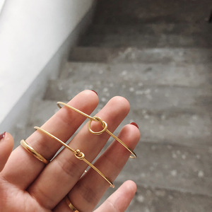 Trendy Minimalist Knotted Knot Cuff Bangle 18K Gold Plated Stainless Steel <b>Thin</b> Hypoallergenic Stackable Women Fashion Jewelry - Product Image 1