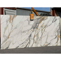 Comptoir de cuisine en marbre Calacatta gris doré sans silice, découpé sur mesure, directement de l'usine chinoise, en porcelaine et pierre de quartz