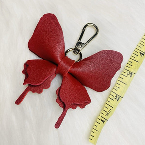 Cross-border spot PU leather bow keychain pendant ornament, fresh and colorful butterfly-shaped <b>bag</b> <b>charm</b> - Product Image 2