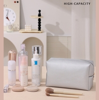 Sac de voyage multifonctionnel grande capacité à prix abordable pour femme, en cuir PU, avec fermeture éclair, étanche, pour cosmétiques et rangement