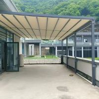 Pergola élégante en aluminium luxueux avec revêtement anti-intempéries et auvent rétractable motorisé, cabane extérieure