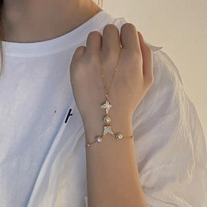 Bracelet chaîne en acier inoxydable avec pendentif œil bleu, chaîne de doigt, chaîne de poignet, forme de squelette, motif floral - Product Image 2