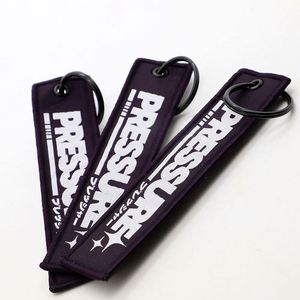 Llavero con Logotipo y Eslogan Personalizados para Eventos Culturales Juveniles y Comunidades de Estilos de Vida Alternativos, Jet Tags - Product Image 4