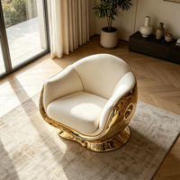 Fauteuil lounge en fibre de verre plaqué or, rembourré en tissu, avec accoudoirs courbes, pour la décoration de villas, d'hôtels et de halls d'entrée.