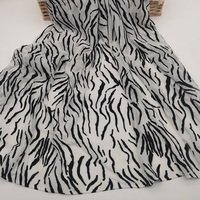 Tissu imprimé léopard pour vêtements, tissu élastique en velours imprimé, tissu en flanelle zèbre, tissu en dentelle, tissu brodé motif vache