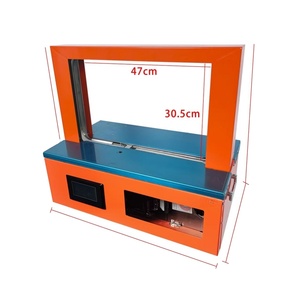 Machine d'emballage semi-automatique pour le cerclage de cartons, destinée aux films, papiers, produits en vrac, matériaux imprimés et articles de première nécessité - Product Image 1