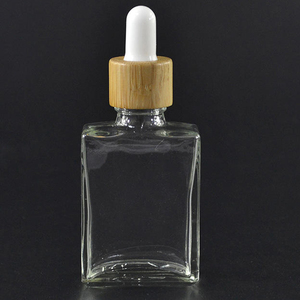 Frasco cuentagotas de botellas de vidrio transparente de aceite esencial de 30ml con tapa de Bambú - Product Image 5