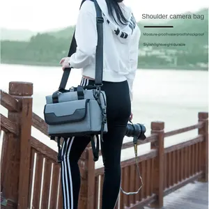 Yeni omuz kamera çantası su geçirmez Crossbody SLR kamera çantası büyük kapasiteli erkekler ve kadınlar açık eğlence taşınabilir asılı çanta