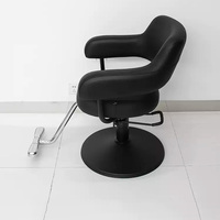 Petit fauteuil de barbier à base de métal noir de haute qualité avec dossier réglable à grande pompe pour salon de coiffure