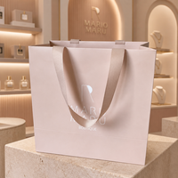 Sac shopping en papier personnalisé avec ruban rose et impression de logo pour boutique de vêtements féminins, emballage de vente au détail