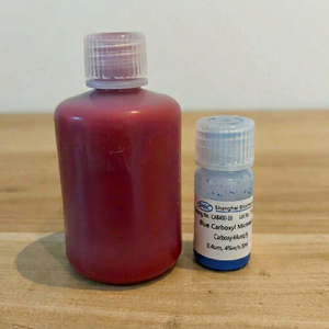 Partículas de Látex PS Carboxiladas Teñidas de Rojo, Verde y Azul, Ideales para Análisis Biológico Visual - Product Image 1