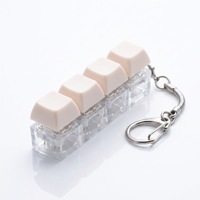 Porte-clés Fidget Macaron 4 touches avec capuchon lumineux, jouet à presser au bout des doigts, vente en gros, personnalisable