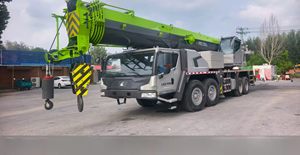 Grue de camion d'occasion 100 tonnes, flèche 60,5 m, hauteur 88,4 m, transmission 8x4, capacité de montée 49%, vitesse 89 km/h, à vendre - Product Image 2