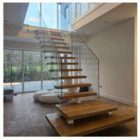 Escalier extérieur en bois massif de style moderne pour villa, en forme de L, droit, flottant, à monopoutre, avec garde-corps en verre durable