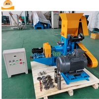 Machine de traitement des aliments Machine à fabriquer des céréales extrudées, du riz, du maïs soufflé, des sucettes pop, des collations en vente