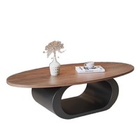 Table basse en bois massif de noyer avec un design minimaliste moderne, forme ovale, pour le salon
