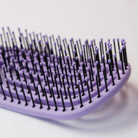 Brosse à cheveux incurvée à poils naturels fins pour le séchage et le massage du cuir chevelu