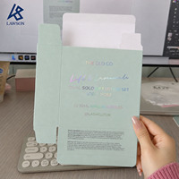 Coffret cadeau personnalisé OEM pour soins de la peau, boîte en papier couleur menthe avec impression holographique pour l'emballage de produits de beauté