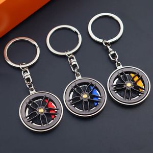 Creative Metal Wheel Hub Keychain Auto Parts Car Mini Tire Wheel Hub Spinner Keychains Accessories Rotating Brake Disc Keychain - Product Image 1