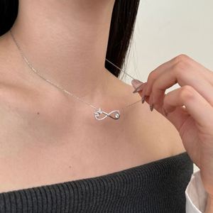 Colliers pendentifs Dylam au design géométrique élégant en argent S925 avec chaîne à maillons et zircone cubique 5A, symbole de l'infini en forme de papillon et chiffre 8 - Product Image 6