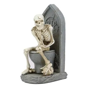 Custom Halloween decor rest in peace resin constipated thinker skeleton figurine sitting on graveyard toilet statue