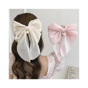 Заколка для волос с жемчужным бантом - Product Image 1