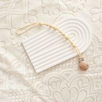 Attache-sucette en silicone pour bébé avec hochet et clip en bois anti-perte pour apaiser le nourrisson et prévenir les chutes