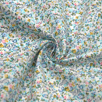 Tissu en coton biologique à imprimés, étoffe personnalisée à motif de petites fleurs bleues à la mode pour femme, imprimés 100%, pour vêtement
