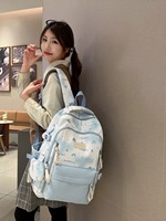 Nouveauté Sac à dos esthétique grande capacité Design unique Sac d'école mignon motif macaron Fermeture éclair Multiples poches Unisexe